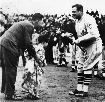 Presented with flowers before a game during the 1934 baseball tour of Japan.