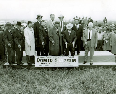 Instead of using shovels, Judge Roy Hofheinz and other officials fire six-shooters at the ceremonial groundbreaking of the Astrodome on January 3, 1962.