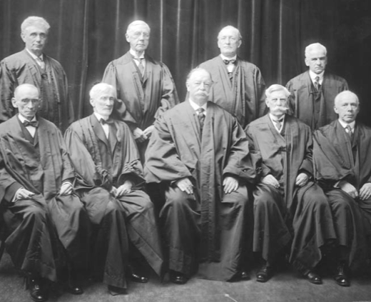 Back row, left to right: Louis D. Brandeis, Mahlon Pitney, James McReynolds, and John H. Clarke. Front row, left to right: William R. Day and Joseph McKenna, Chief Justice William Howard Taft, and Oliver Wendell Holmes and Willis Van Devanter.
