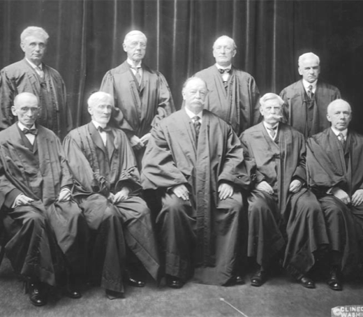 Back row, left to right: Louis D. Brandeis, Mahlon Pitney, James McReynolds, and John H. Clarke. Front row, left to right: William R. Day and Joseph McKenna, Chief Justice William Howard Taft, and Oliver Wendell Holmes and Willis Van Devanter.