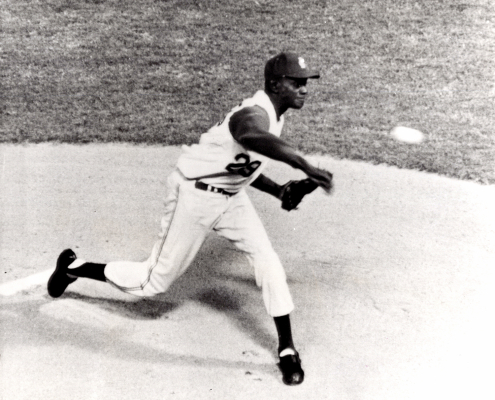 Satchel Paige pitching with the Kansas City Athletics in 1965. (SABR-Rucker Archive)