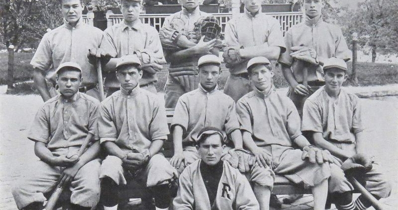 Schoolboy Babe Ruth (with catcher’s gear) pictured with his team from St. Mary's Industrial School, and three of the Xaver- ian brothers who ran the school (in the gazebo). (PUBLIC DOMAIN)
