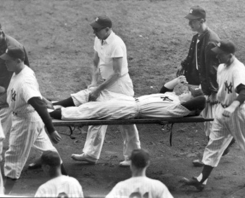 Mickey Mantle is carried off on a stretcher after injuring his knee during the 1951 World Series at Yankee Stadium. (NATIONAL BASEBALL HALL OF FAME LIBRARY)