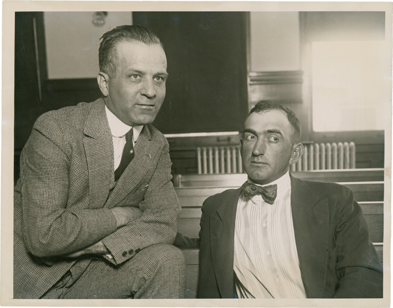 Shoeless Joe Jackson, right, confers with prosecutor Hartley Replogle during Jackson's grand jury testimony on September 28, 1920, in Chicago. (BLACKBETSY.COM)