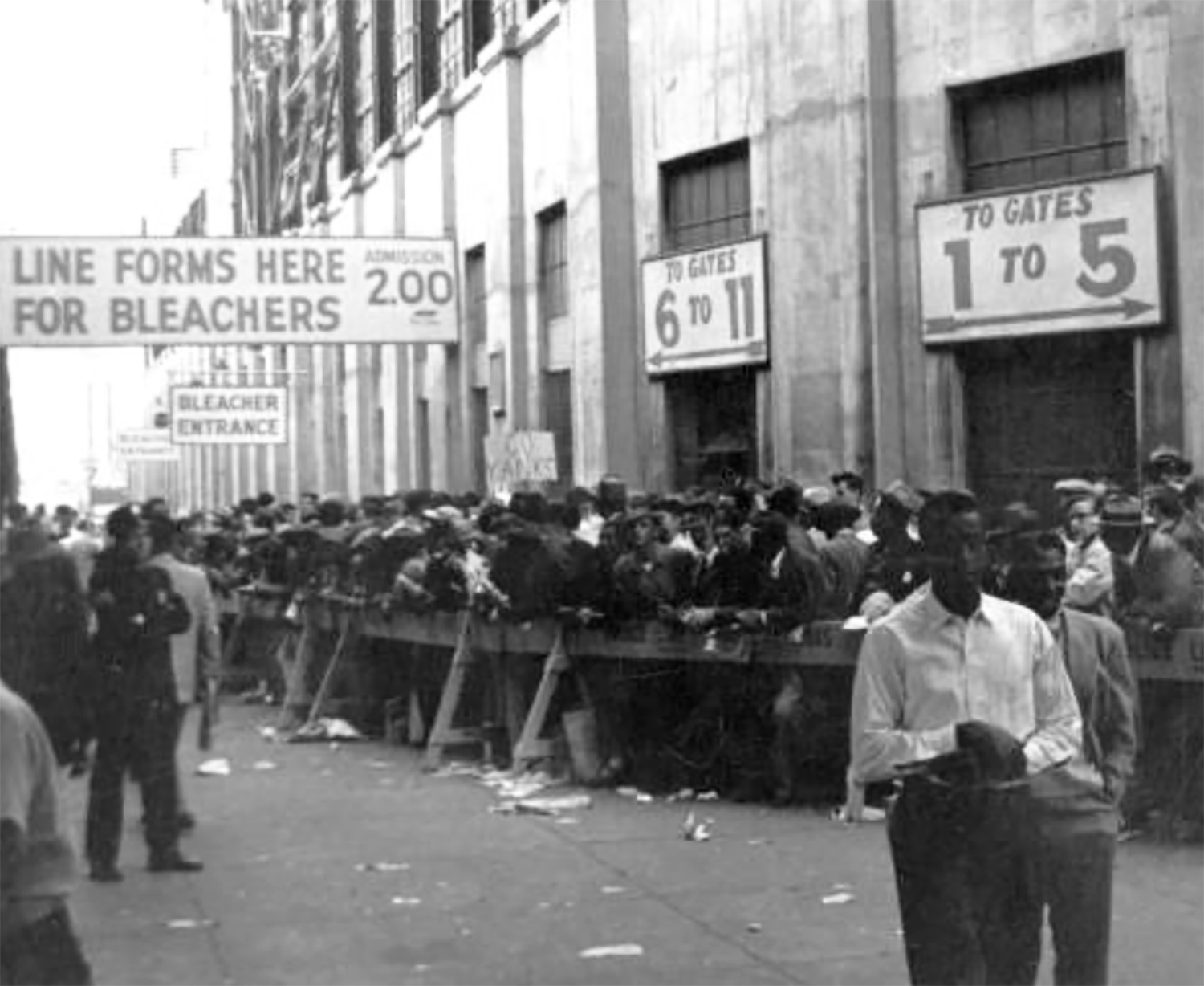 Black baseball fans wait in line to enter Ebbets Field for a World Series game in October 1949. Jackie Robinson's presence in the Dodgers lineup ensured that ballparks around the National League would be full of Black fans every time he played. (SABR-RUCKER ARCHIVE)