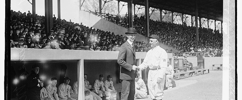 Clark Griffith, right, and Philadelphia A's manager Connie Mack shake hands on Opening Day 1919 at Griffith Stadium in Washington, DC. The Washington Senators began playing at Griffith Stadium in 1912. (LIBRARY OF CONGRESS)