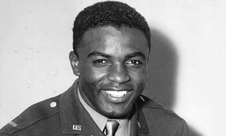 On July 6, 1944 he defied a white bus driver’s orders to move to the back of the bus “where the coloreds belonged.” When the base provost marshal and military police supported the driver, Robinson objected vehemently and was subject to court-martial. Facing a dishonorable discharge, Jackie prevailed at the hearing. But the Army had had enough of the controversial young black lieutenant and quickly mustered him out with an honorable discharge. (NATIONAL BASEBALL HALL OF FAME LIBRARY)