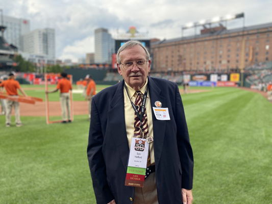 SABR founding member Tom Hufford on the field at Camden Yards before the Orioles ballgame on August 19, 2022