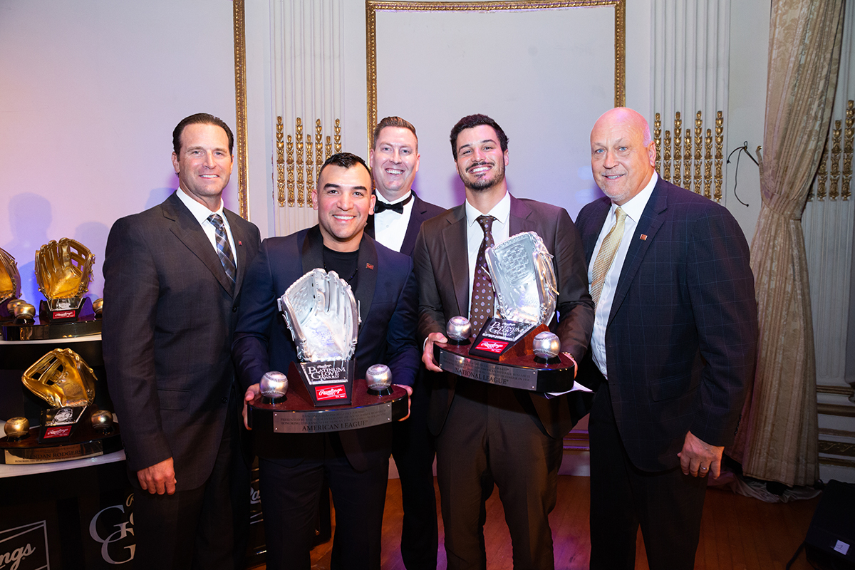 2022 Rawlings Platinum Glove Award winners Jose Trevino (second from left) and Nolan Arenado (fourth from left) are joined by Hall of Famer Mike Mussina (far left), SABR CEO Scott Bush (center) and Hall of Famer Cal Ripken Jr.