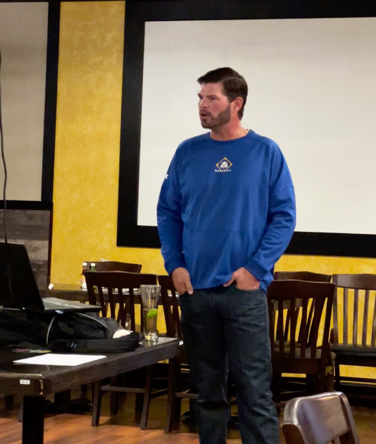 Bryan Henry speaks during the SABR Buck O'Neil/North Florida Chapter meeting on December 6, 2023.