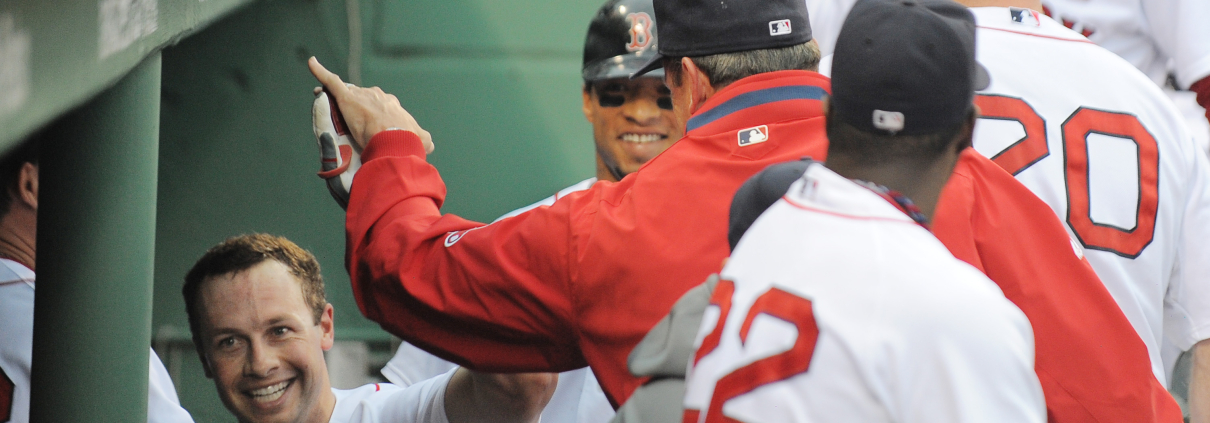 Daniel Nava celebrates with teammates after hitting a grand slam in his first major-league at-bat on June 12, 2010. (Courtesy of the Boston Red Sox)