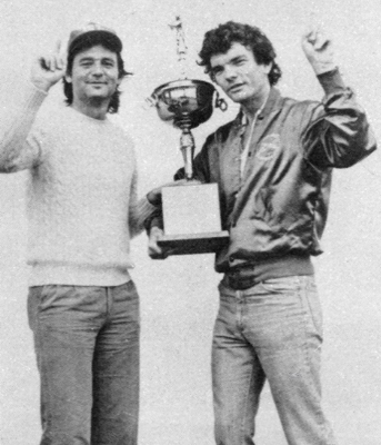 Comedian Bill Murray and baseball executive Van Schley hold up a trophy (Courtesy of the Aberdeen Daily World)