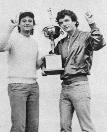 Comedian Bill Murray and baseball executive Van Schley hold up a trophy (Courtesy of the Aberdeen Daily World)