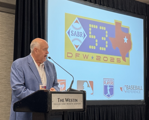 Texas Rangers public address announcer Chuck Morgan speaks during the Texas Rangers Ballparks Panel on June 26, 2025, in Irving, Texas.