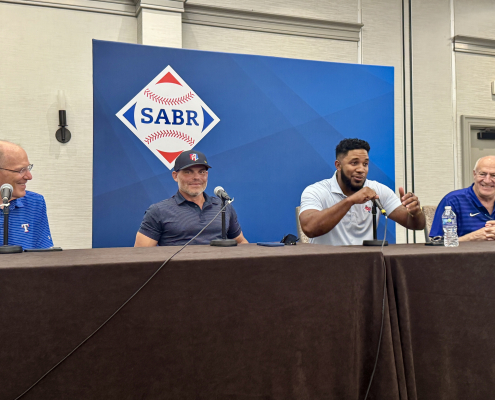 At SABR 53, the Texas Rangers Hitters Panel included, from left, Tom Grieve, Iván Rodríguez, Elvis Andrus, and moderator Eric Nadel on June 26, 2025, in Irving, Texas.